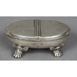 A Continental white metal box and cover, possibly a table snuff With twin hinged cover,