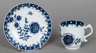 An 18th century Lowestoft porcelain coffee can and saucer Decorated with the Sunflower pattern,