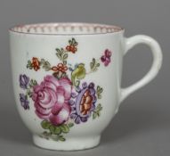 An 18th century Lowestoft porcelain coffee can Polychrome decorated with floral sprays. 6 cm high.