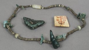 An antique American Indian necklace Comprising predominantly turquoise and quartz beads and with