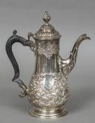 A George III silver coffee pot, hallmarked London 1768,