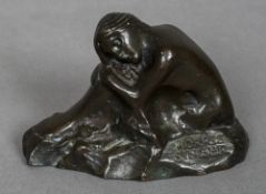 An early 20th century patinated bronze model of a seated mermaid Signed Maurice Singer,