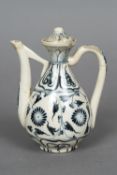 A Chinese blue and white porcelain ewer and cover Of baluster form,