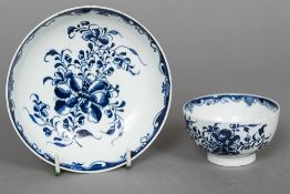 An 18th century Lowestoft porcelain tea bowl and saucer Decorated with the Mansfield pattern,