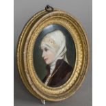 A 19th century German porcelain plaque, probably Berlin Worked with a portrait,