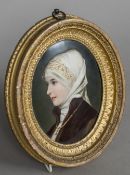 A 19th century German porcelain plaque, probably Berlin Worked with a portrait,