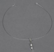 An Italian contemporary 14 ct white gold and diamond set pendant necklace The pendant adjustable,