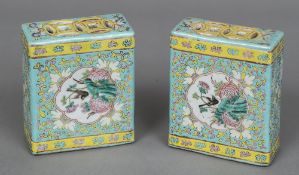 A pair of Chinese porcelain flower bricks Decorated with bird vignettes within lotus strapwork,