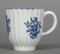 An 18th century Lowestoft porcelain coffee can With scalloped rim and ribbed body,