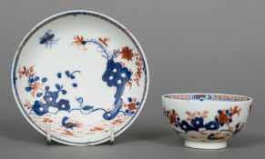 An 18th century Lowestoft porcelain tea bowl and saucer Polychrome decorated with the Cock and Hen