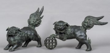 A large pair of 17th/18th century Chinese bronze temple lions Each typically modelled.