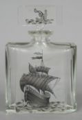 An early 20th century Continental etched glass decanter Of chamfered rectangular form,