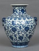 A Chinese blue and white porcelain baluster vase Decorated with lotus strapwork,