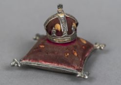 A silver pin cushion, hallmarked Birmingham 1910,