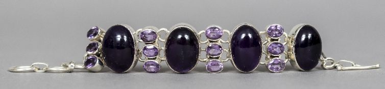 A 925 silver and amethyst designer bracelet 20 cm long.