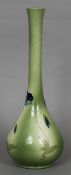 An Ault art pottery vase With long slender neck above the bulbous main body,