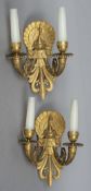 A pair of Empire ormolu wall lights Each twin branch issued from a peacock,