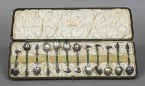 A set of twelve silver and green stone coffee spoons, hallmarked Birmingham 1899,