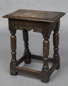 A 17th century style oak joint stool The moulded rectangular top above the carved frieze,