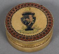 An 18th/19th century tri-colour gold inlaid jasper box and cover Of circular section,