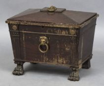 A Regency mahogany wine cooler The stepped domed removable lid with brass lion mask and ring handle