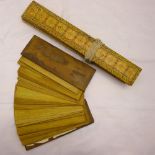 A Far Eastern antique prayer book The decorated wooden boards containing a quantity of prayers on