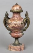 A 19th century bronze mounted variegated marble urn Of typical form,