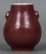 A Chinese porcelain vase With allover ox blood glaze,