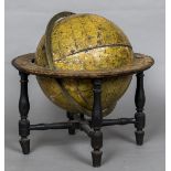 A 19th century Cary's New Terrestrial Globe Of typical form, mounted on a table top stand,