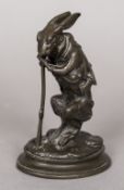 A patinated bronze model of a hare Modelled as a hunter, the base inscribed Arson. 12.25 cm high.