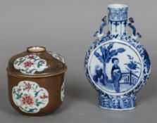 A 19th century Chinese blue and white porcelain twin handled moon flask Decorated with figural