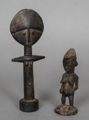 An African Ashanti tribe carved wood doll Together with an African tribal carved wood figure of a