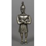 A small white metal model of an early soldier Modelled with arms crossed, with detachable head.
