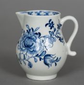 A Lowestoft porcelain sparrow beak cream jug Decorated with the Sunflower pattern. 7.5 cm high.