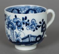 An 18th century Lowestoft porcelain coffee can Decorated with floral sprays. 6 cm high.