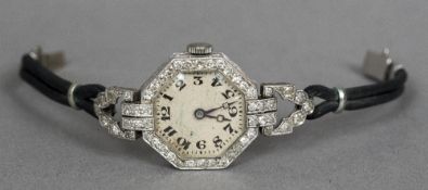 An Art Deco lady's diamond set Rolex cocktail watch Of octagonal form,