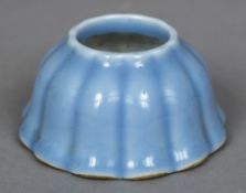 A Chinese porcelain beehive brush pot Of ribbed form,