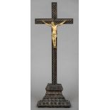 An 18th/19th century ivory and carved wooden crucifix Typically modelled. 40.5 cm high.