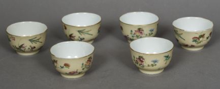 A set of six 19th century Chinese porcelain tea bowls Each decorated with various insects and frogs