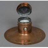 An Arts and Crafts copper inkwell Of Capstan type form, with mother-of-pearl mounts,