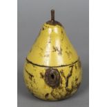 A carved wood and painted pear shaped caddy Of typical form, with hinged cover. 16 cm high.