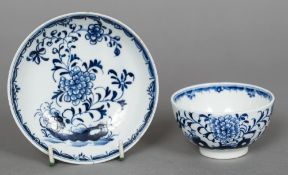 An 18th century Lowestoft porcelain tea bowl and saucer Decorated with the Grapes and Roots pattern.