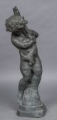 A lead water fountain Formed as a putto holding a fish. 107 cm high.