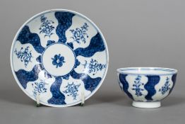 An 18th century Lowestoft porcelain tea bowl and saucer Decorated with the Robert Browne pattern.
