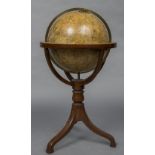 A late 19th/early 20th century celestial globe Of typical form, mounted on a mahogany stand.