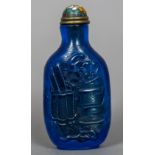 A Chinese carved blue Peking glass snuff bottle With cloisonne lid,