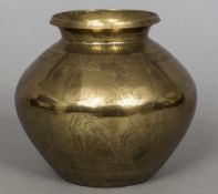 A 19th century Indian brass lota Of baluster form, engraved with Christian scene vignettes. 14.