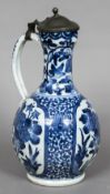 A 17th/18th century Japanese blue and white porcelain ewer With hinged pewter lid,