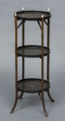 A Victorian bamboo framed lacquered etergere Each circular section decorated with birds amongst