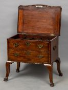 An early 19th century mahogany cellaret Of commode form,